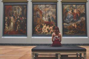 Woman sitting at the art gallery